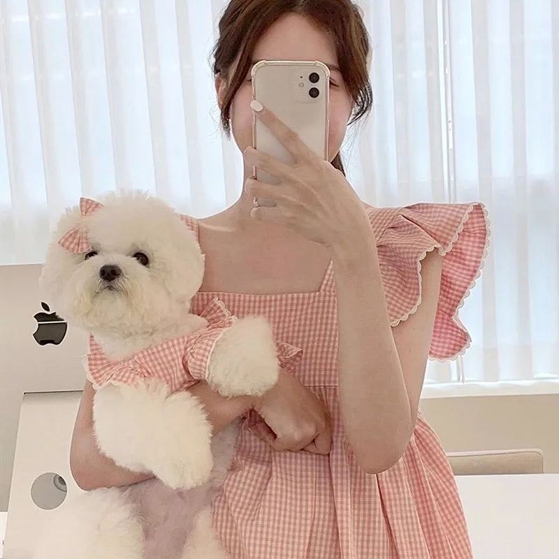 Spring/summer new pet dog dress pink plaid and lace. Suitable for both dogs and cats and will definitely place them on Any Best Dressed List. Multiple Sizes.