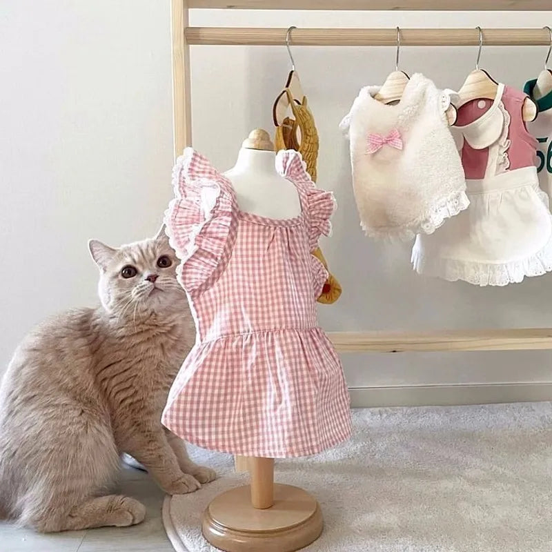 Spring/summer new pet dog dress pink plaid and lace. Suitable for both dogs and cats and will definitely place them on Any Best Dressed List. Multiple Sizes.