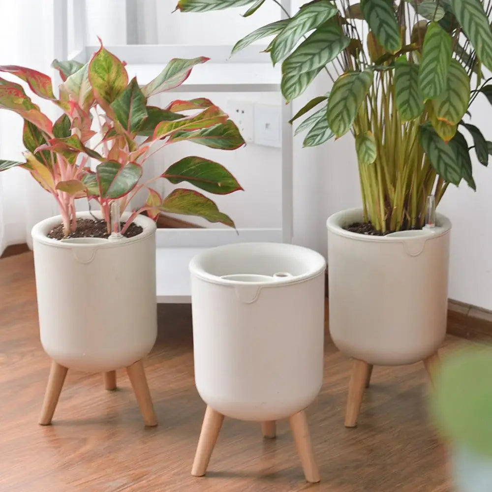 New Automatic Self-Watering Flower Pot With Water Level For Home Indoor Outdoor Garden Flower Pot With Wooden Legs. Love These. Perfect for Those of us that Forget to Water!!