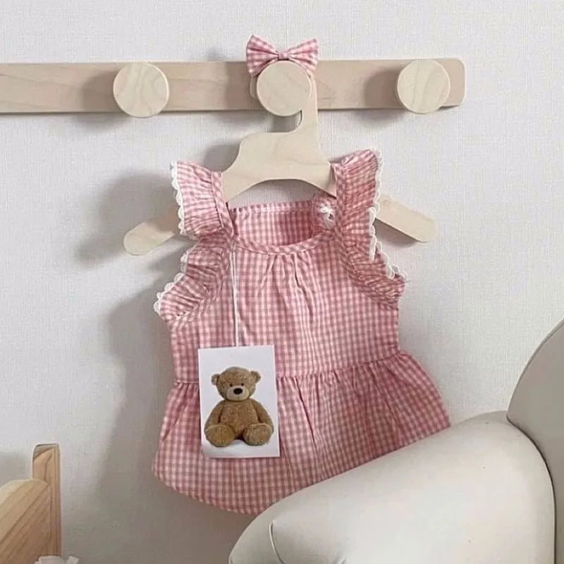 Spring/summer new pet dog dress pink plaid and lace. Suitable for both dogs and cats and will definitely place them on Any Best Dressed List. Multiple Sizes.